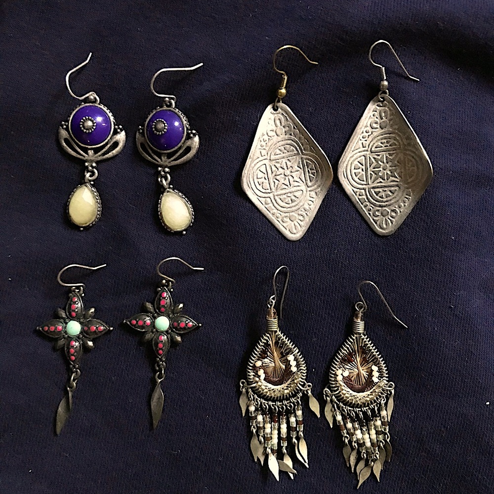 4 pair of vintage earrings to be sold as a lot.